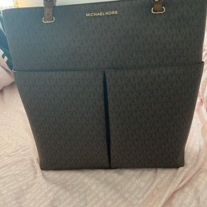 Lg MK  bag w/ mtchng wallet. Usd twice . Is always stored in protective MK bag.